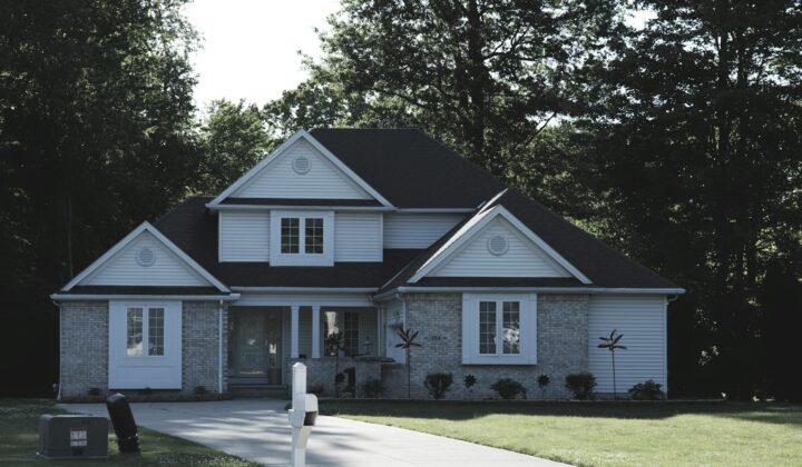 Modern suburban house with a green lawn