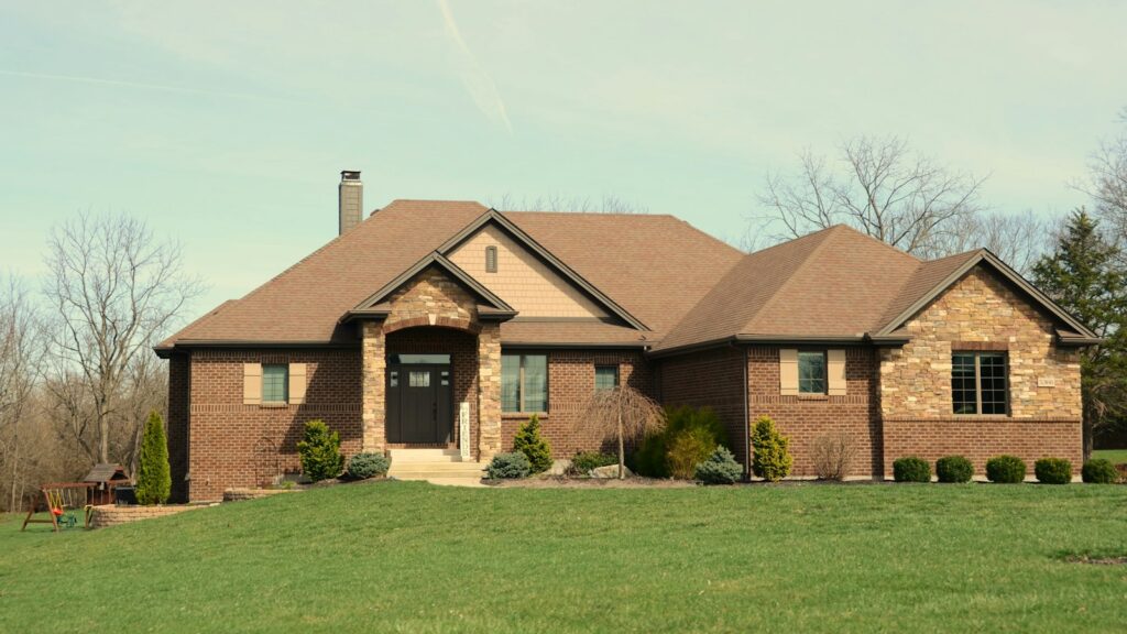 Large brick house with a stone facade
