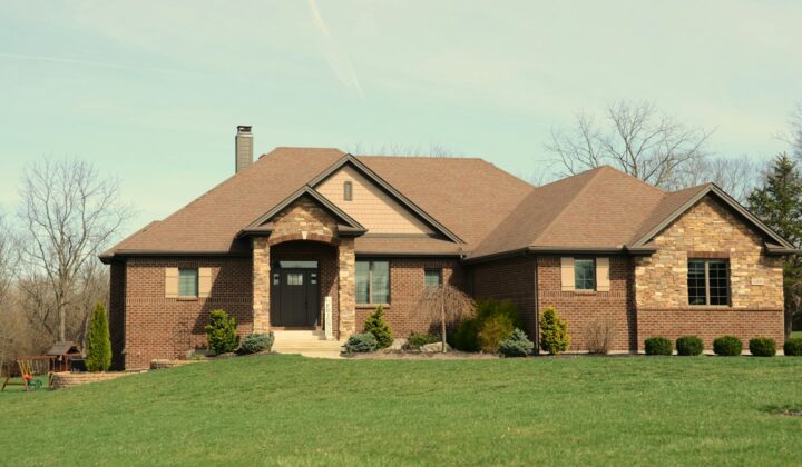 Large brick house with a stone facade